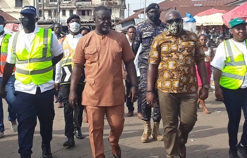 MCE FOR NJSMA, Mr Isaac Appaw-Gyasi and Eastern Regional Minister, Seth Acheampong with taskforce inspecting the streets during decongestion exercise