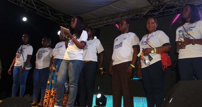 Mrs Delese Darko (with microphone) addressing students and guests at the launch.