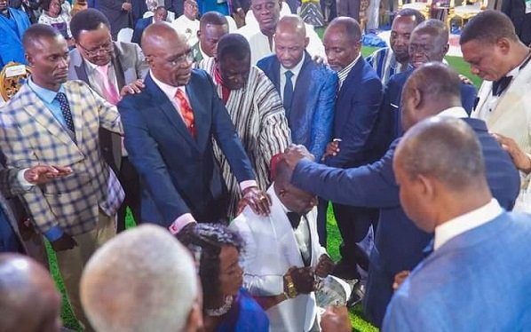 Present and Past Executive Presbytery Officers offering prayers for Rev and Mrs Awintia during the induction ceremony.