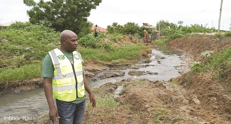 Mr Nii Bortey assessing the progress of work
