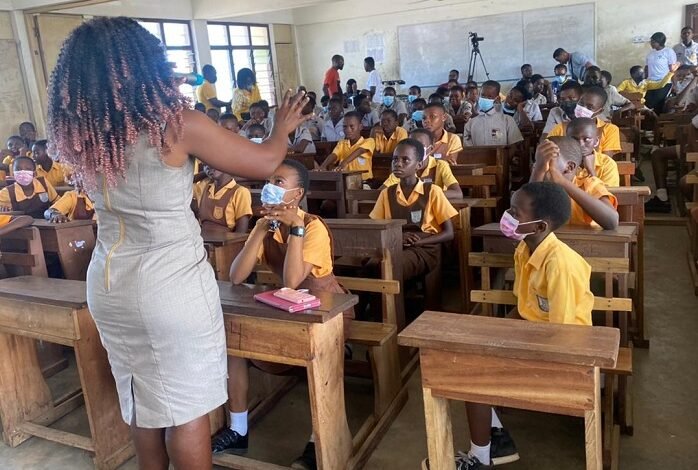 Official of MTN addressing the pupils