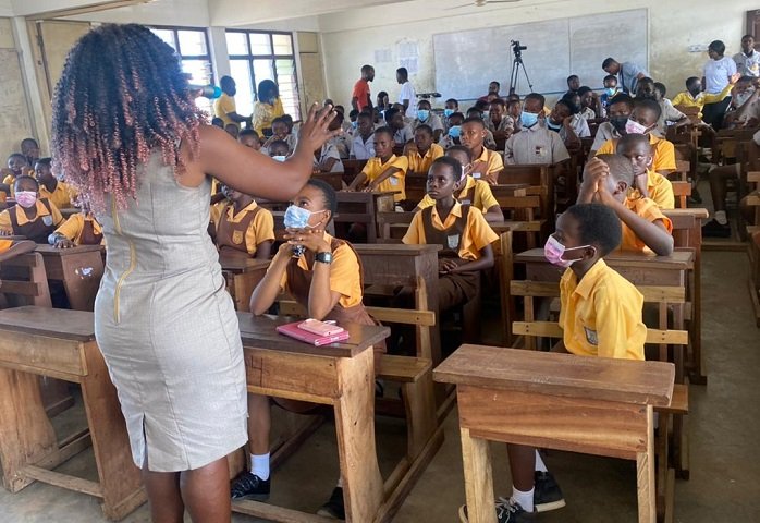 Official of MTN addressing the pupils