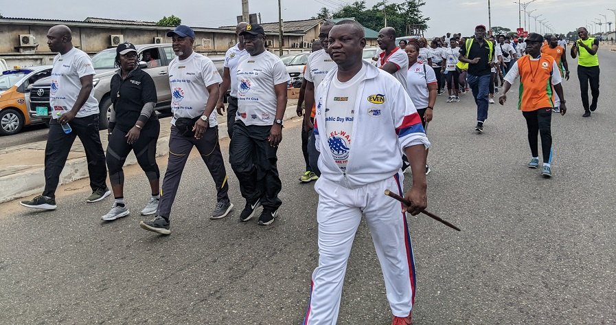 • Executives of the club lead the walk