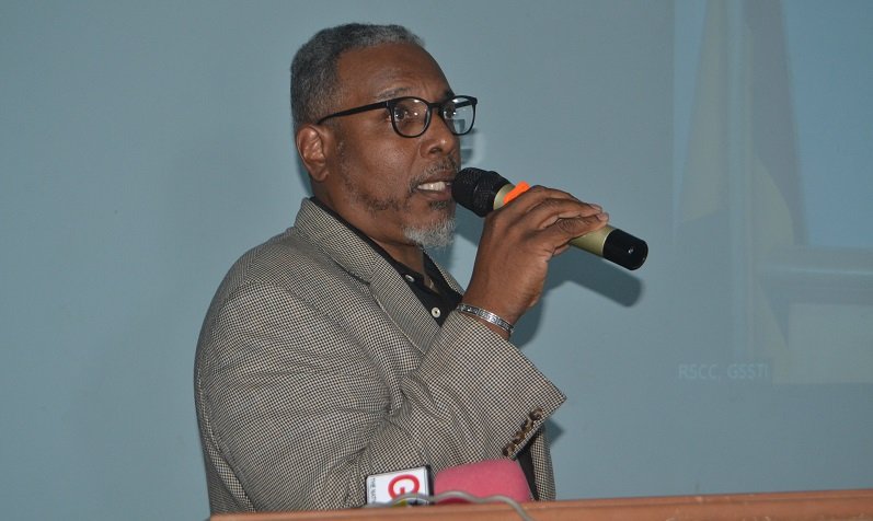 • Prof. Wayne Scales (inset) speaking at the programme Photo: Victor A. Buxton