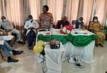 Dr Mrs Owusu-Sarpong (standing) addressing the staff