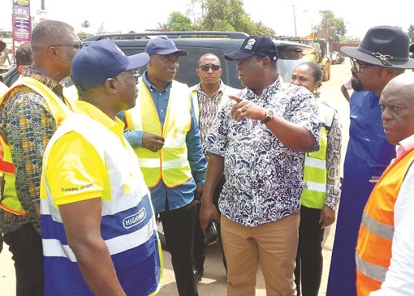 Mr Kwasi Amoako-Atta (second from right) interacting with officials during the tour