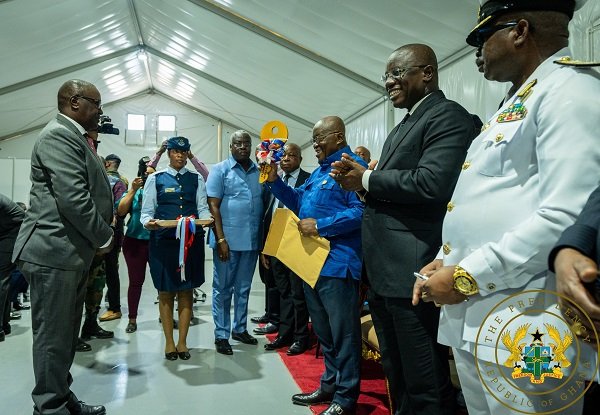 • President Akufo-Addo (third from right) handing over the keys to management of the facility