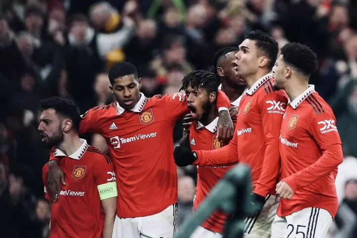 • Fred (middle) being joined by teammates to celebrate his equaliser for United