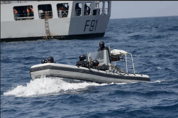 • Nigerian naval special forces patrol during a navy exercise with the United States