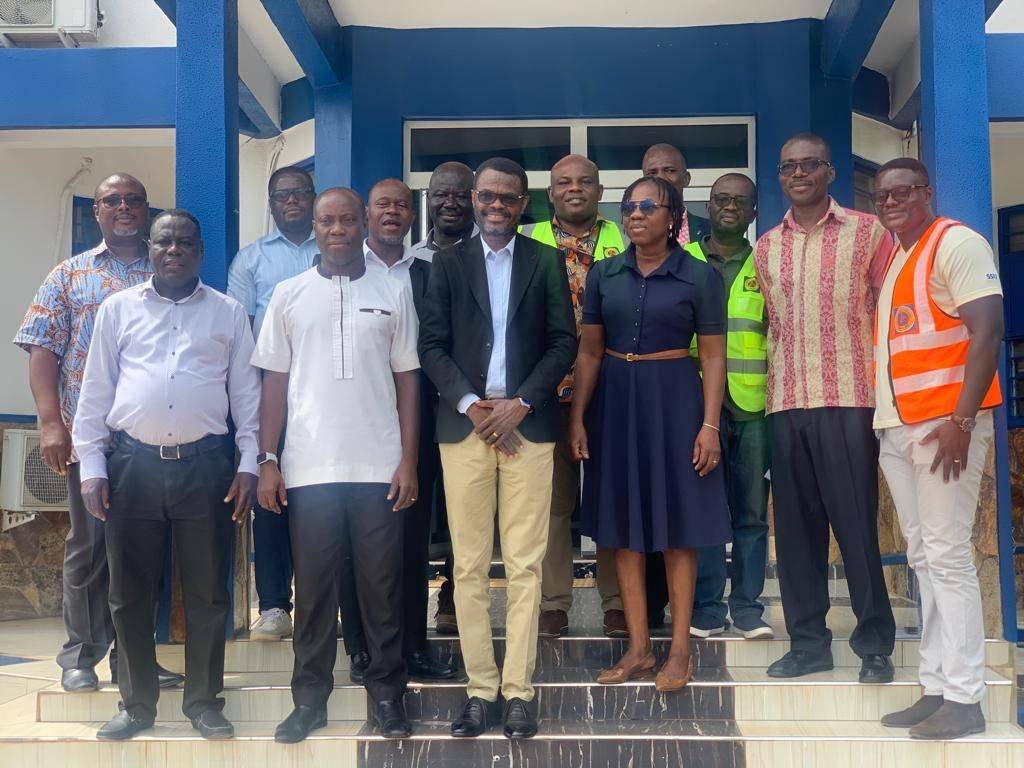 Mr Michael Buabin with Ghana Water Company Limited officials after the meeting