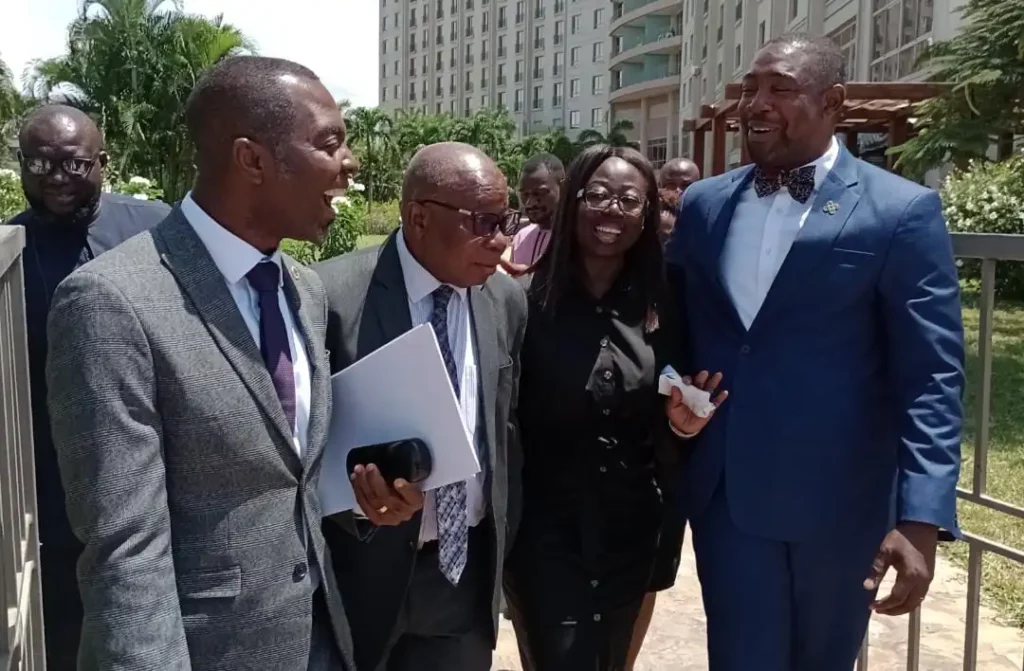 Mr Agyeman-Manu (second from left) with Dr Bernard Okoe Boye(right) and other officials after the programme.