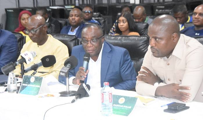 • Mr Kwasi Agyemang Busia (middle) addressing the meeting. With him are Mr Darious Kollie (right), leader of the Liberian delegation and Mr Abraham Zaato (left), Deputy CEO, DVLA Photo: Michael Ayeh