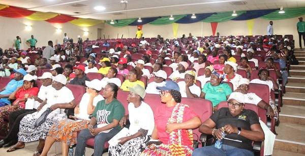 Mr Andrew Ameckson (inset) addressing the traders at the financial education campaign. Photo. Ebo Gorman