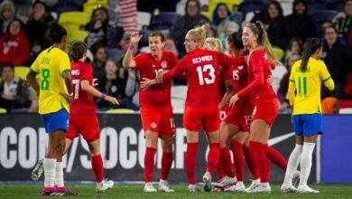 Canada players celebrating a goal