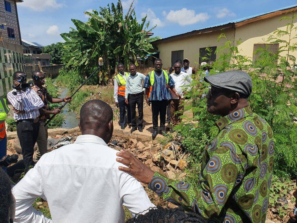 Mr Dan Botwe (right) with the team inspecting a drinage at Kwashibu in Accra. Photo Godwin Ofosu-Acheampong