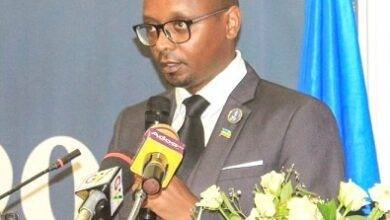 Mr Rurang (inset) speaking at the programme