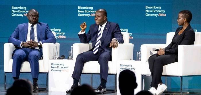 Mr Samuel A. Jinapor (middle) speaking at the programme