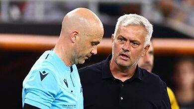 Mourinho (right) and Ref Taylor after the controversial game
