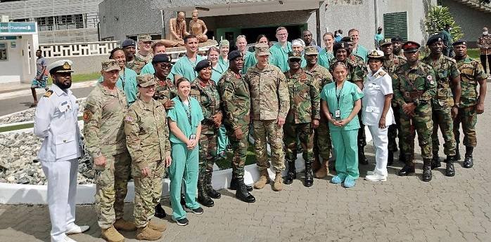 Major General Wasmund (middle) with MEDREX team and medical doctors at 37 military Hospital
