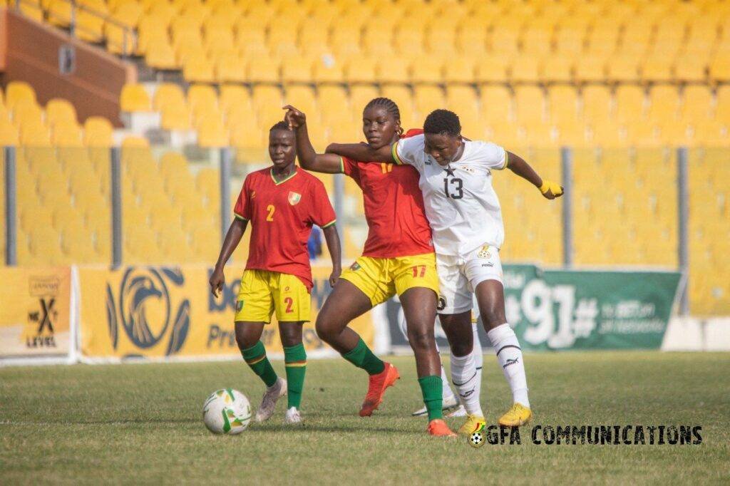 Badu battles for the ball with her Guinean challenger, Sylla Salematou