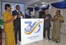 Mr Whittal (second from left) with Mr Charles Abani and other dignitaries after unvailing the anniversary brand logo Photo Victor A. Buxton