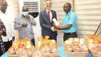 Mr Ken Ofori-Atta (right) presenting the items to Ambassador Huseyin Gungor (third from left).With them are officials of the ministry. Photo. Ebo Gorman