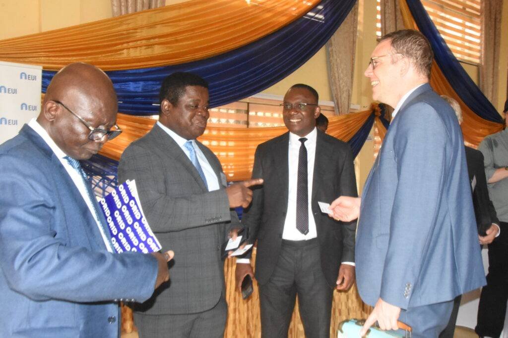 Prof Peter Quartey  (second from left) in a chat with Pieter Smidt Van Gelder (right). With them are Prof Felix Ankomah Asante (left) and Mr Kenneth Amaeshi Photo Michael Ayeh