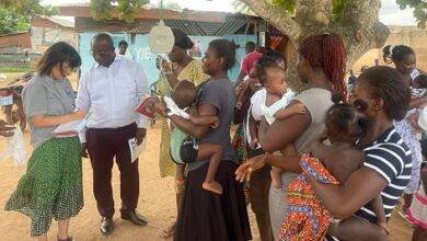 Mr Adomako (second from left) engaging some nursing mothers during an outreach programme in the district