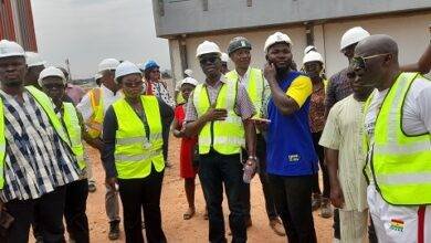 • The Minister (left) and other officials at the Legon Sports Stadium