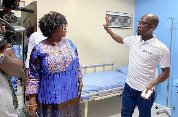 Mrs Mensah being conducted round the wards by Dr Isaac Kofi Adu, a Clinical Embryologist