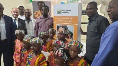 Rev Fordjour (fourth from left) being assisted by Dr Nkansah and other dignitaries during the unveiling of a new INSET Package