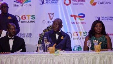The Asantehene (middle) seated with Vodafone CEO (right) at the dinner