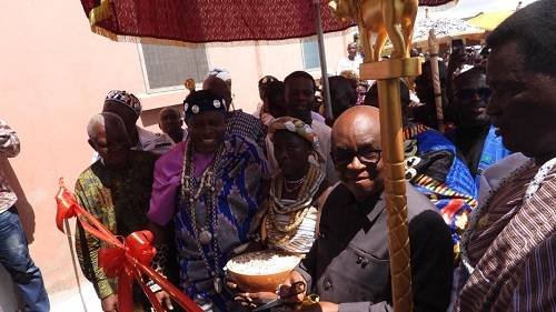 Inset; Dr Archibald Letsa being assisted by other dignitaries to commission the project