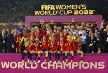 Ecstatic Spanish players and officials celebrate the Women's World Cup feat with their medals and trophies