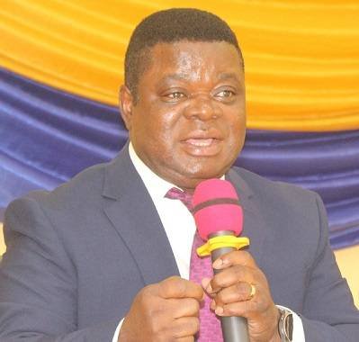 Prof. Peter Quartey (inset) making a presentation on the mid year budegt review. Photo. Ebo Gorman