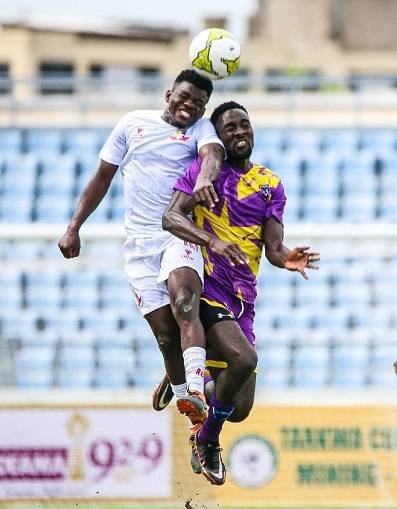 Jean Vital (right) in an aerial tussle with his marker Adedayo Olamilekan