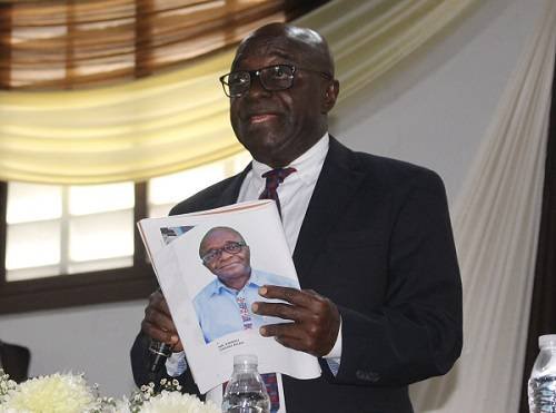 Mr Kwaku Owusu Baah (inset) addressing shareholders at the meeting Photo Anita Nyarko-Yirenkyi
