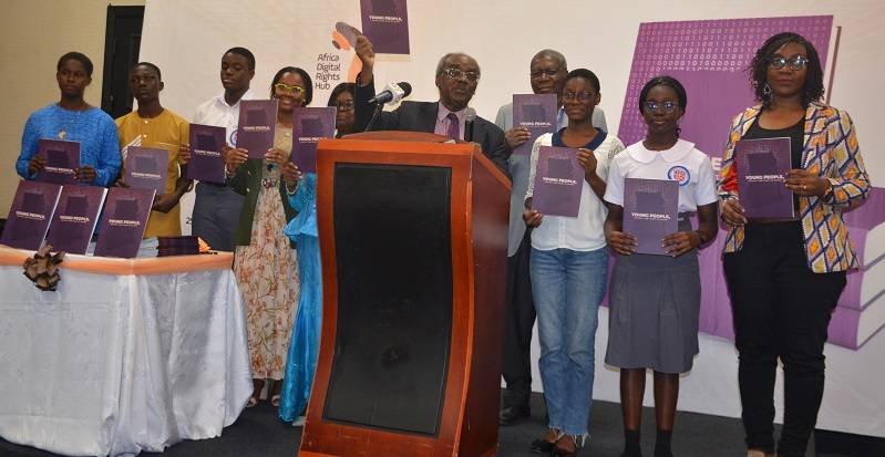 Prof Justice S.K Date-Bah(middle)with some youth launching the report. Photo Godwin Ofosu-Acheampong