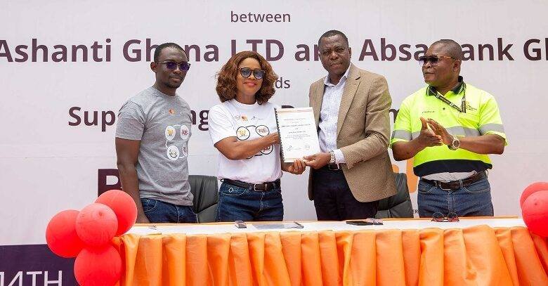 Officials of the two institutions displaying the signed MoU