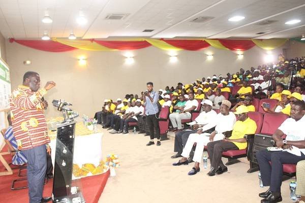 Mr Ignatius Baffour Awuah (standing) addressing participants in the international co-operative celebration day . Photo. Ebo Gorman