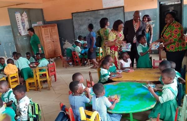 Master Sandra Owusu-Ahenkorah presenting the package to the pupils