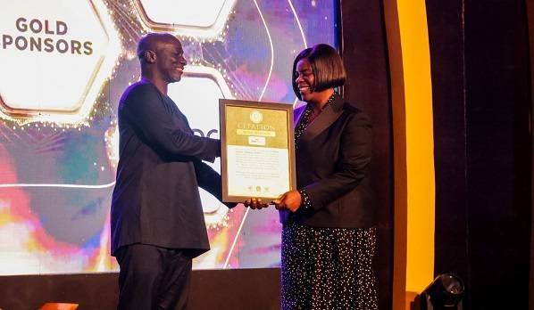 Mrs Djamson – Tettey receiving the award