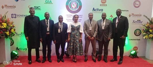 Mrs Nkansah-Badu (middle) with Mr Ando (second left) with some dignitaries in the programme