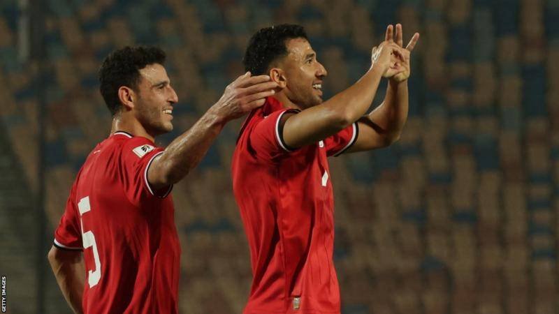• Trezeguet (right) joined by team mate to celebrate his second goal against Djibouti