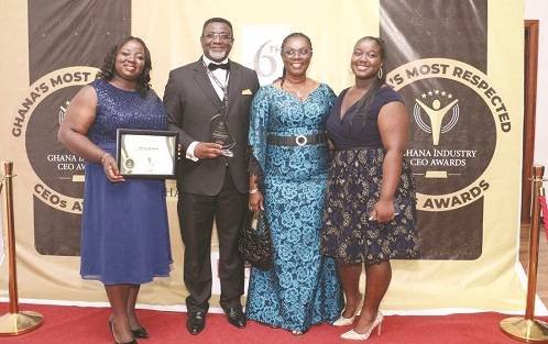 • Dr Andy Osei Okrah with Mrs Ursular Owusu-Ekuful, (second from right), His wife, Alice and daughter Hilary (right)