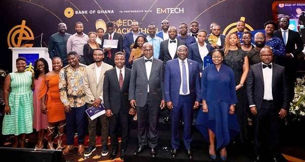 Dr Bawumia (third right front) and Dr Addison (fourth left) with other dignitaries and the award winners during the programme • Mr Baffour-Awuah addressing the conference and behind him are some union leaders and management of Anglo Gold Ashanti, Obuasi. leadership in the digital transformation