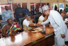 Mr Alban Bagbin (right) interacting with some of the chiefs at the programme