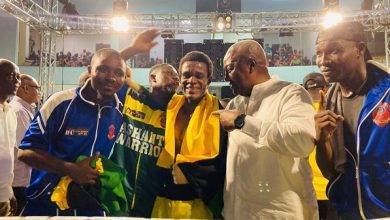 Former President Mahama with the Ashanti Warrior and members of his technical team after the fight