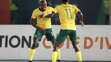 • Percy Tau and Zwane celebrating the team's opener
