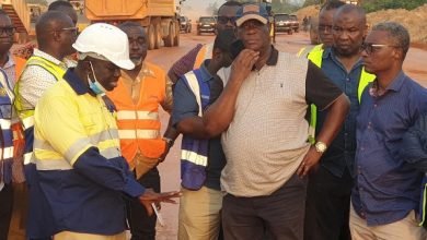 Mr Amoako-Atta(second from right) with his team inspsecting one of the projects